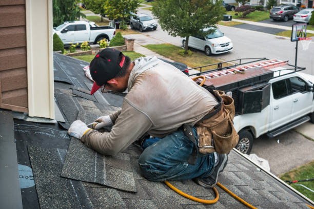 Professional Roofing technician working in Drake, KY